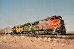 Santa Fe B40-8W #507 (with BN SD40-2 #6833, ATSF GP20 #3072 & GP38-2 #2375) lead an eastbound autorack train 